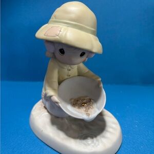Charming Figurine with Hat and Bowl